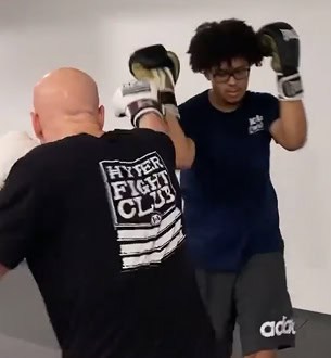 Kickboxing training session at Johnny Karate NYC focusing on technique and fitness.