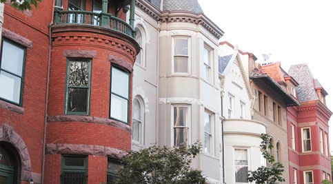 Close-up of historic masonry and tuckpointing on Victorian-style row houses.