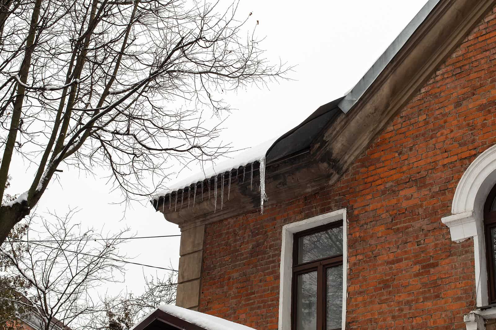 Close-up of historic brick masonry with tuckpointing work on a building exterior.