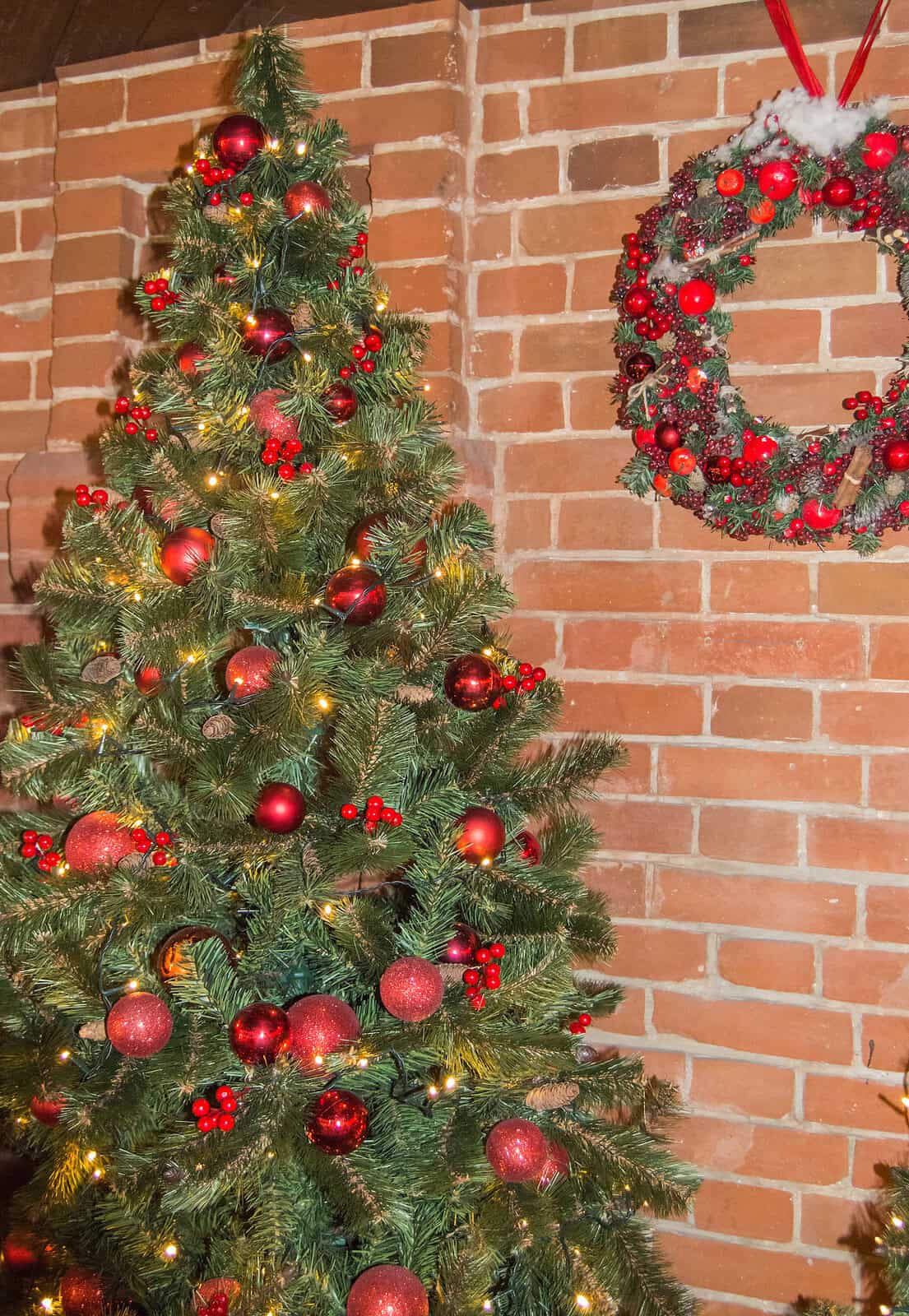 Christmas Tree with Red Ornaments and Lights.