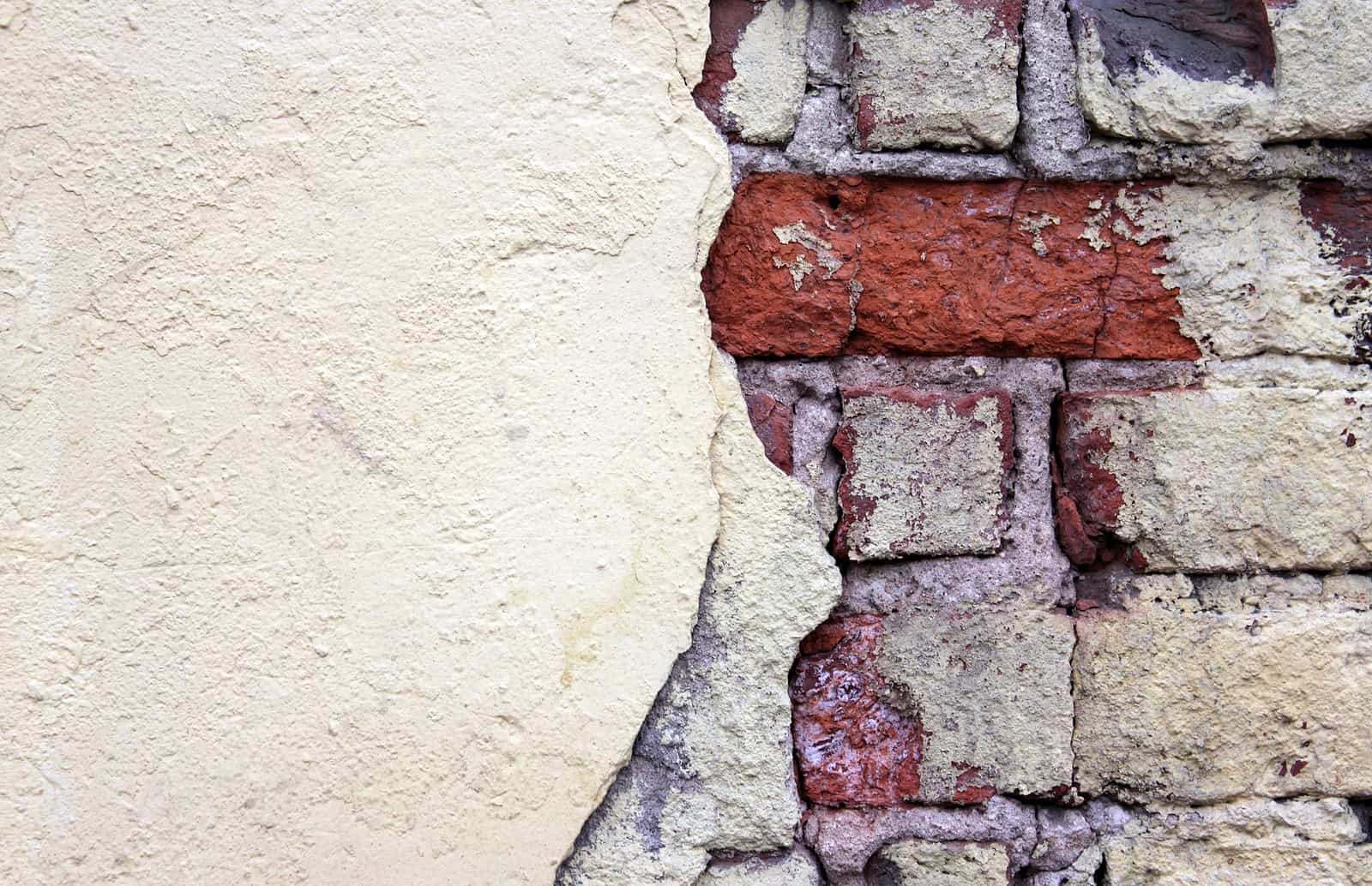 Close-up of historic masonry and tuckpointing work on a building wall.