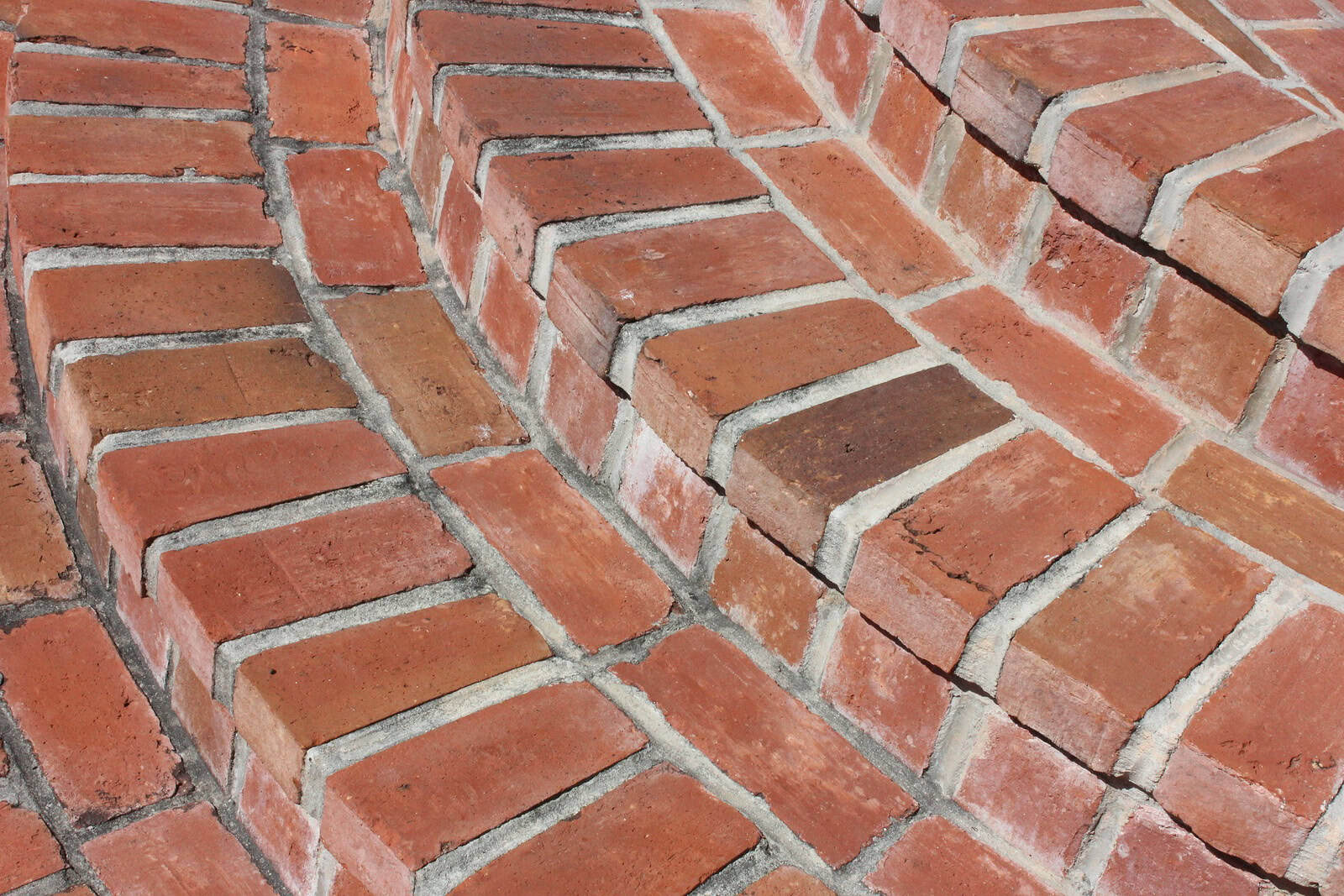 Historic brick masonry with detailed tuckpointing work.