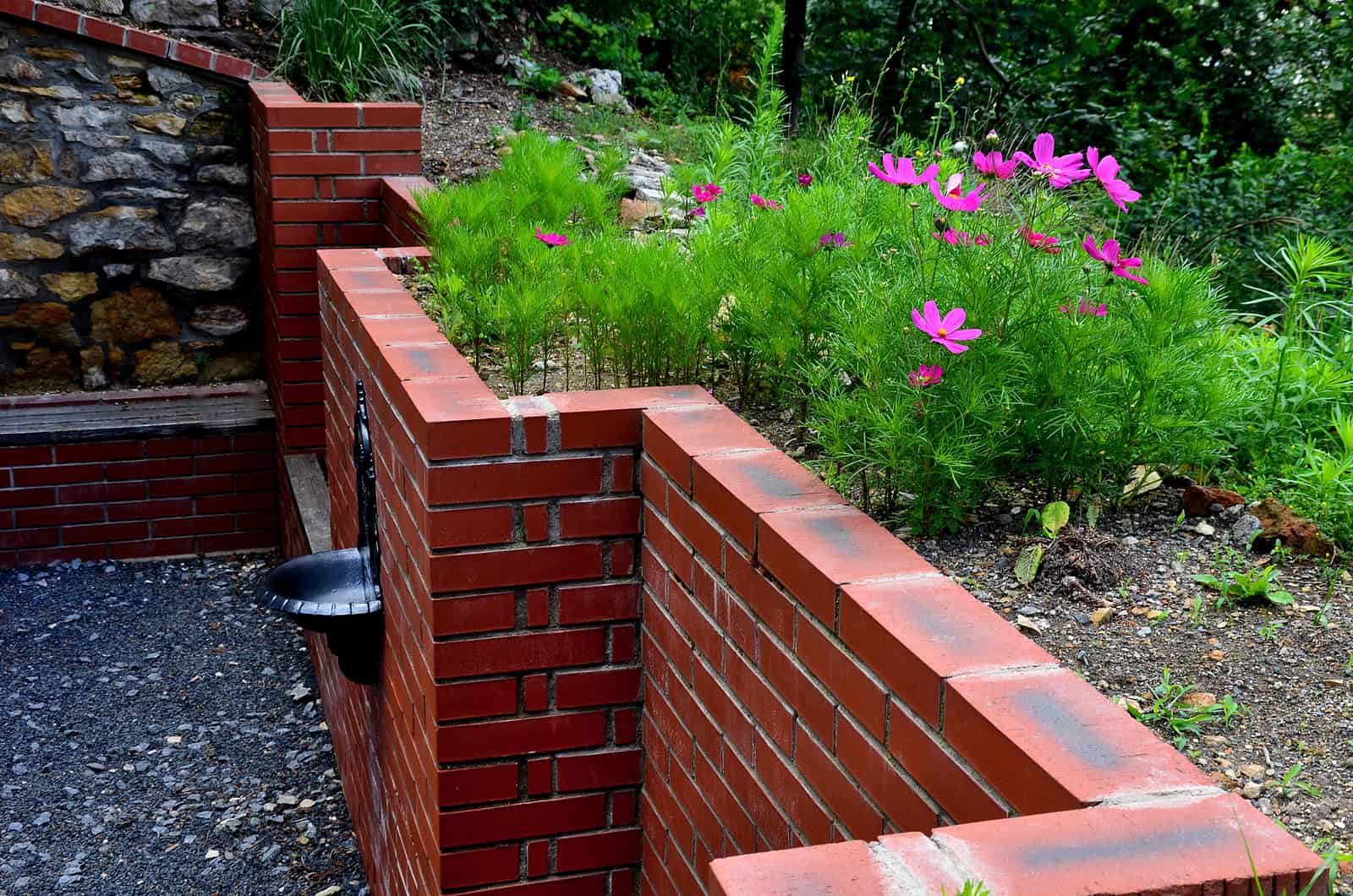 Beautiful brick masonry with fresh tuckpointing and garden landscaping.