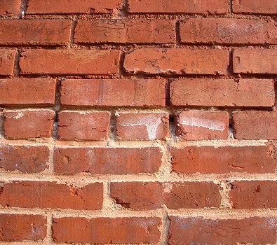 Close-up of historic brick masonry with tuckpointing details.