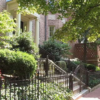 Close-up of historic brick masonry with tuckpointing on a Renaissance-style building.