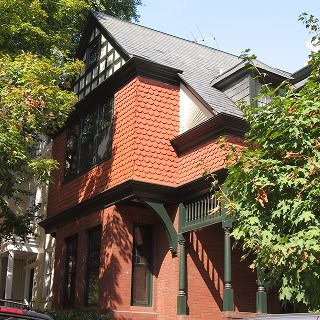 Beautiful historic brick building showcasing Renaissance-style masonry and tuckpointing work.