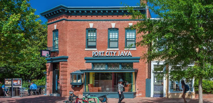 Historic brick building with Renaissance architecture and detailed masonry work.