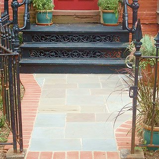 Historic masonry and tuckpointing on a classic brick building facade.