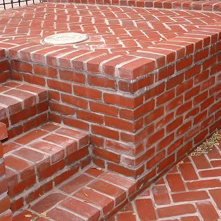 Close-up of historic brick masonry and tuckpointing work.