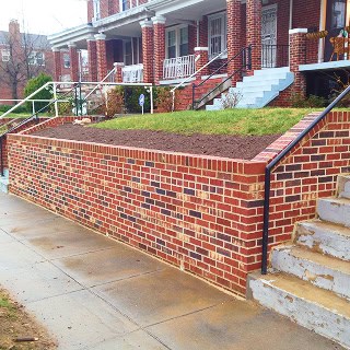 Historic masonry and tuckpointing work on a residential building.