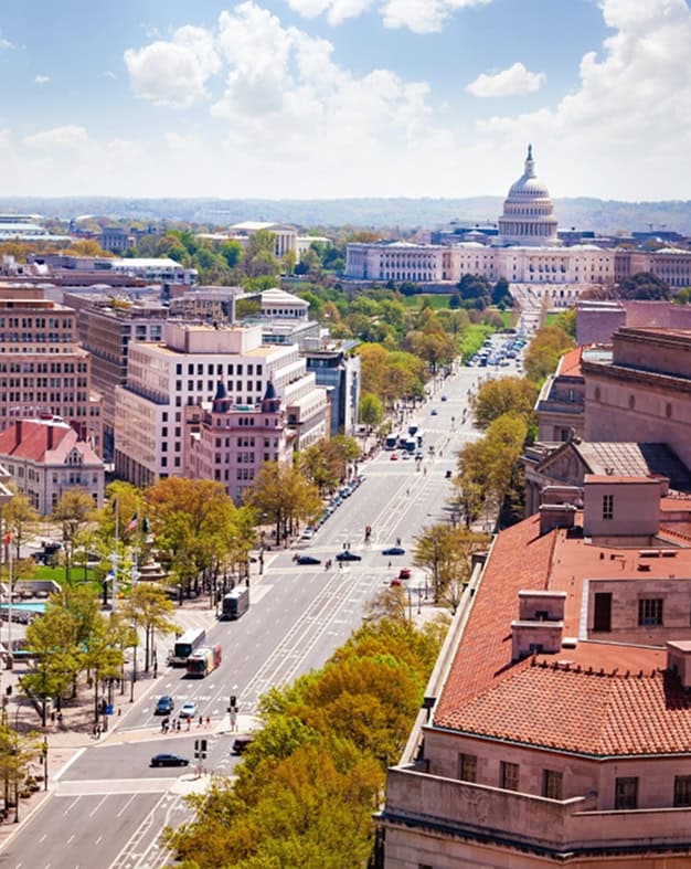 Historic masonry and tuckpointing work on a building in downtown Washington, D.C. with the Capitol i.