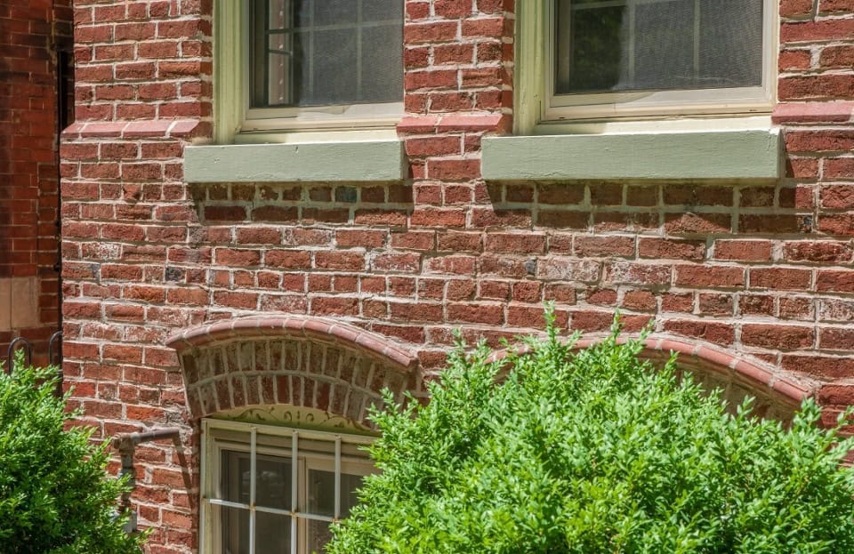 Close-up of historic brick masonry with tuckpointing work.