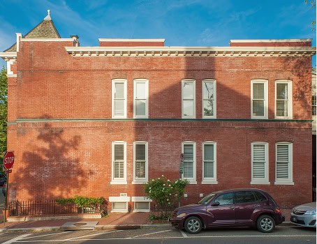 Renaissance Development historic masonry and tuckpointing work on a brick building.